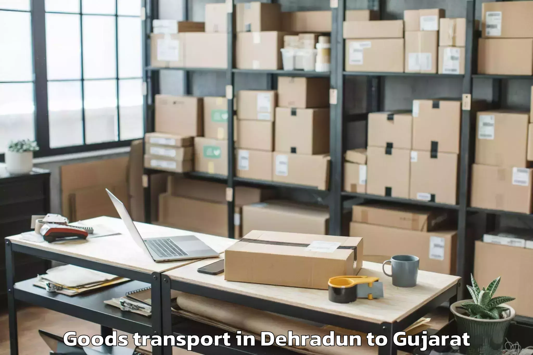 Trusted Dehradun to Sarangpur Goods Transport